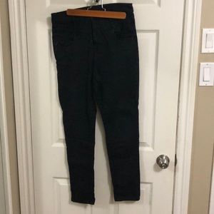 Black high waist BDG skinny jeans.